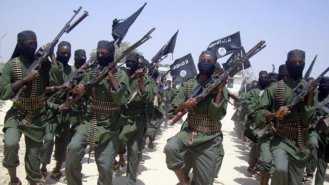 2011 Al-Shabab fighters march with their guns during military exercises on the outskirts of Mogadishu, Somalia. Source: AP