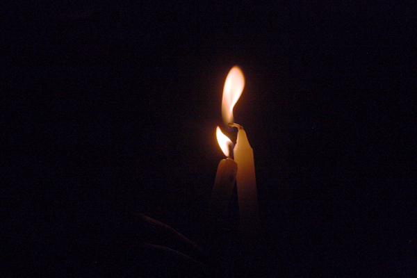 A picture taken on April 8, 2015 shows two candles lit in commemoration of the 148 lives lost during a recent attack by the Al-Shabab insurgents in Garissa, Kenya. The Islamist terrorist group killed mostly students in the recent attacks in one of the biggest attacks in Kenya since 1998. PHOTO BY AMOS RIOT