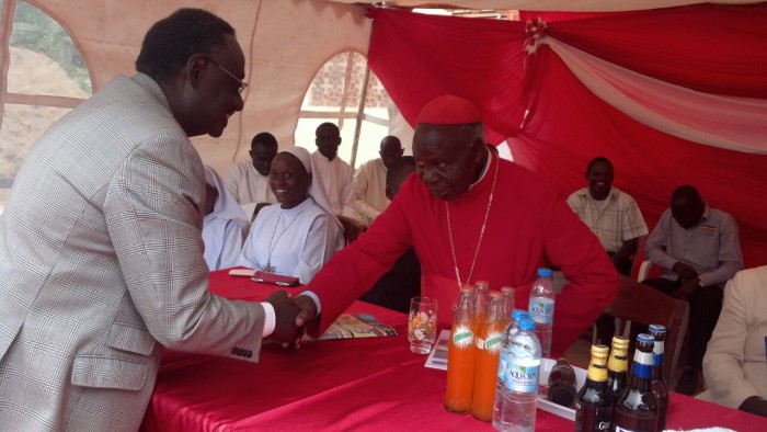 Sejusa greets cardinal Wamala