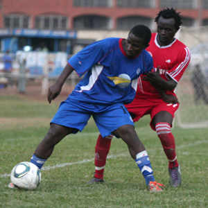 Villa's Stephen Bengo (Blue) protects a ball from vipers