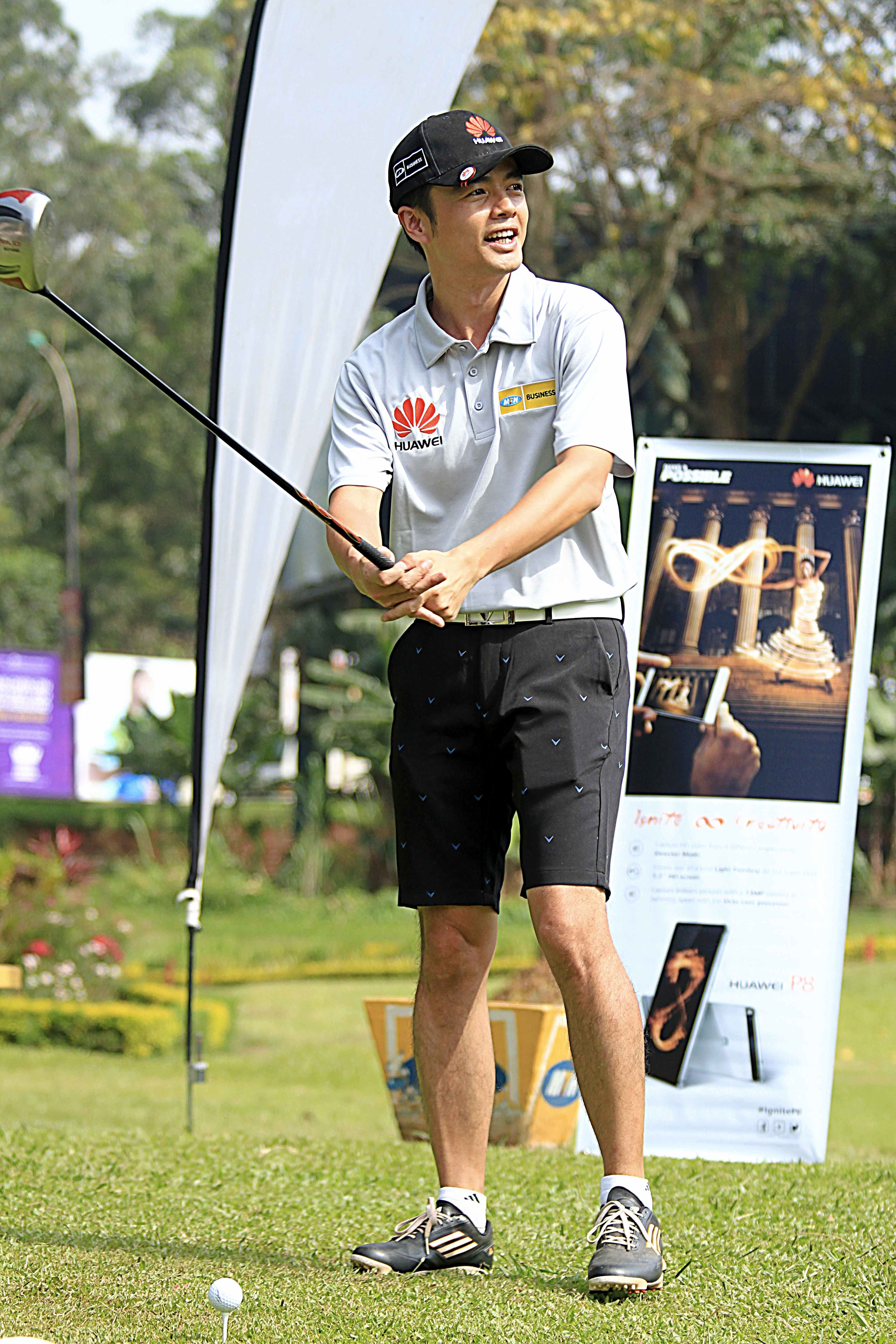 Mr. Stanley Chyn, MD Huawei Teeing off at the course.