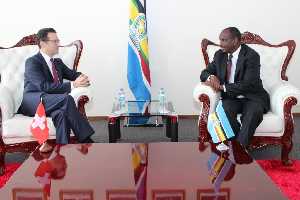  The Swiss Ambassador to the EAC Arthur Mattli (left) confers with the EAC Secretary General, Dr Richard Sezibera, after the envoy presented his credentials to the Secretary General.