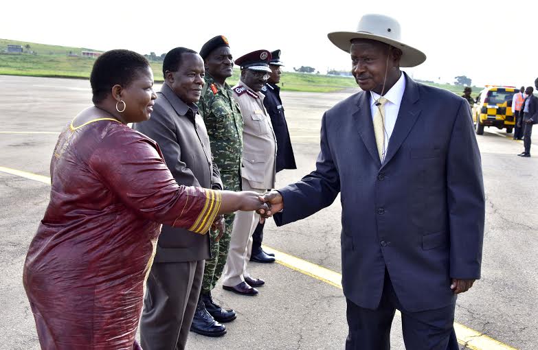 President Yoweri Museveni being seen off by top security and party officials at Entebbe International Airport.